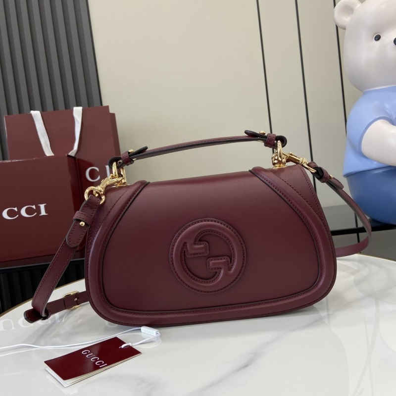 G*u*i top handle bags